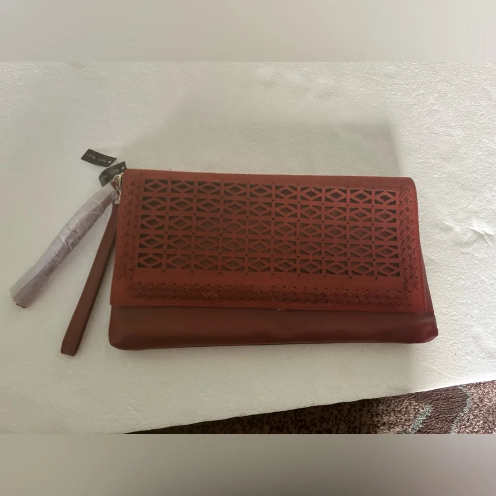 White House black market NWT rust wristlet purse lattice detail with duster bag